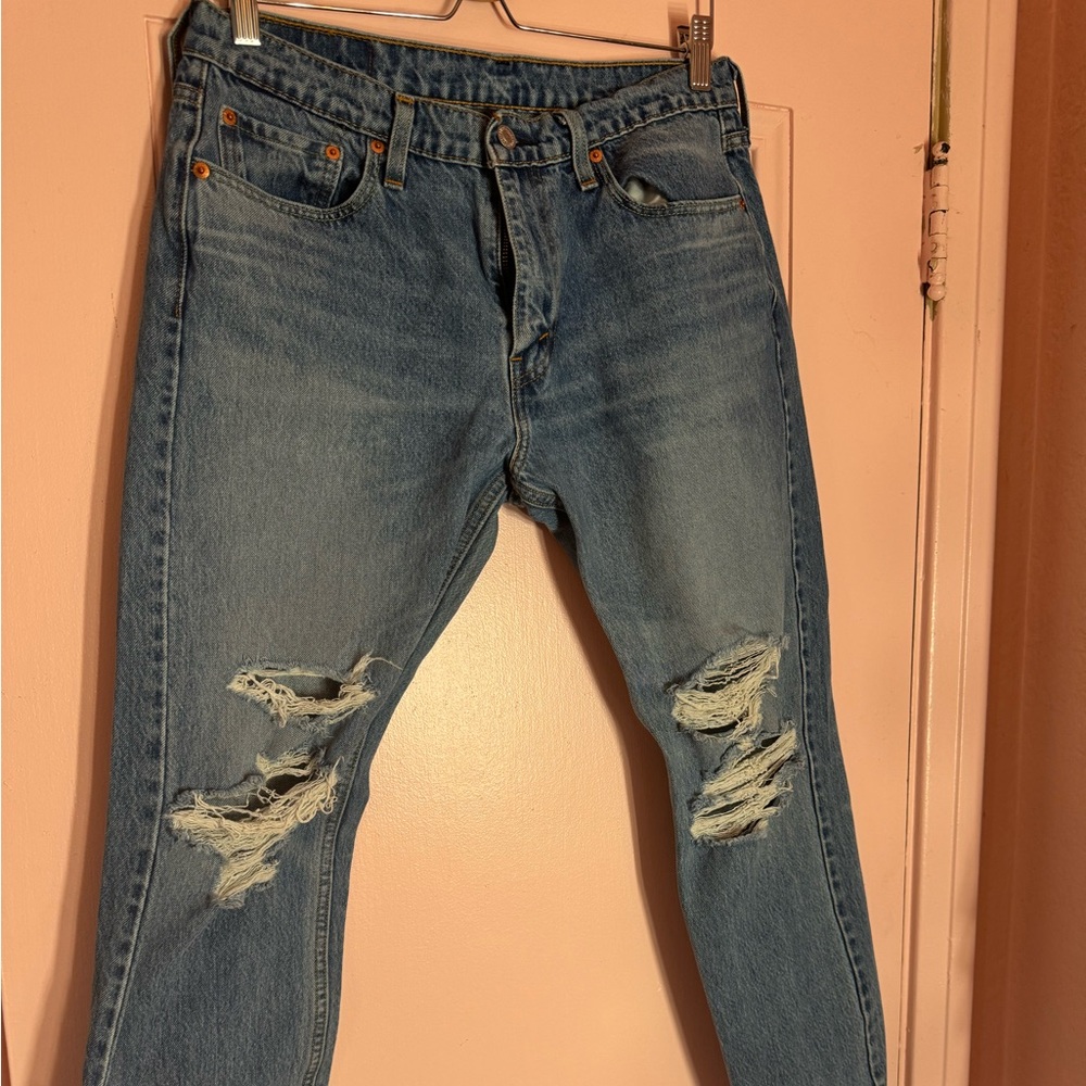 Levi’s 513 distressed pants